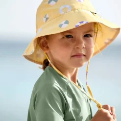Chapeau anti-UV bébé réversible - Lassig - Bouée jaune pâle
