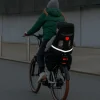 Tablier pour siège vélo enfant - Rainette - Noir avec des bretelles oranges